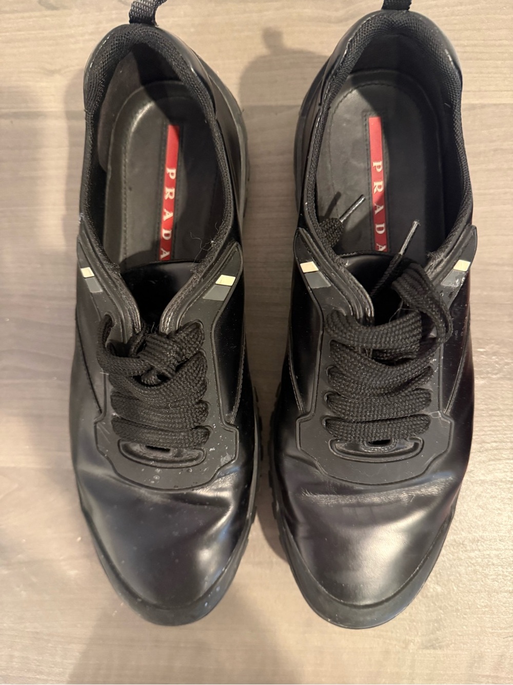 Prada Black Leather Lace-Up Men's Sneakers with Red Insole Stripe